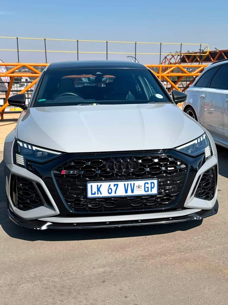 Grey Audi RS3 owner-driven arrival car
